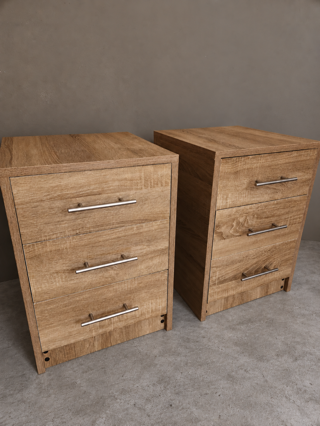 Two matching wood-grain cabinets with three drawers each on a gray floor against a plain wall